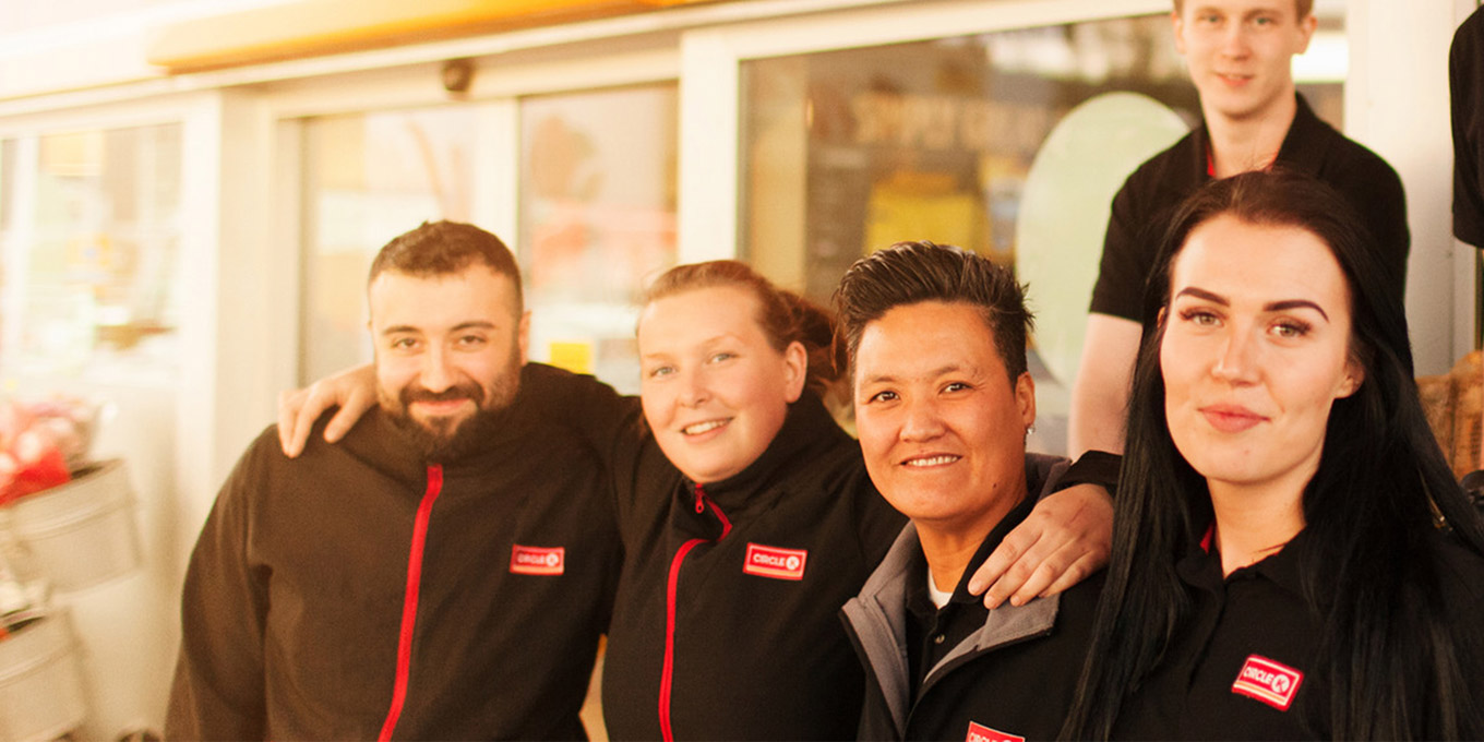 Group of happy Circle K employees