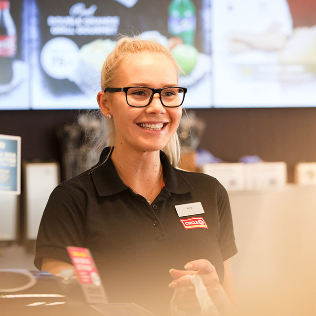 A happy Circle K employee