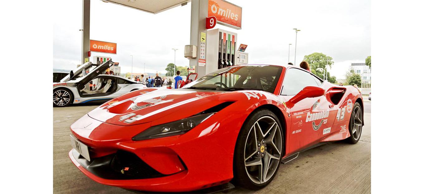 Racing car making a pit stop at Circle K during Cannonball event